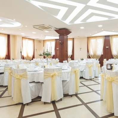 The banquet hall, laid for a function