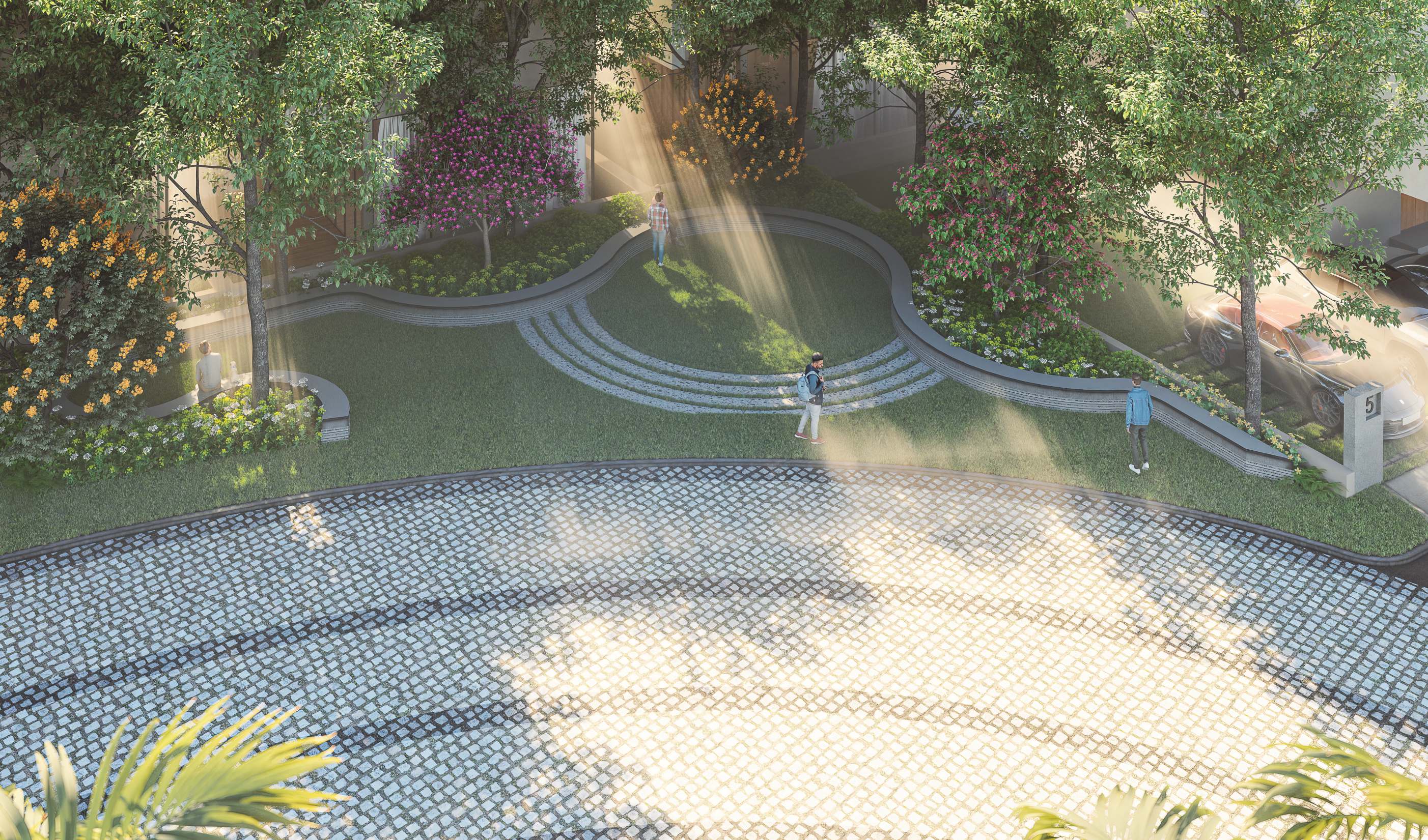 Stepped lawns and planting between the villas